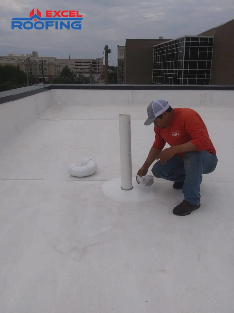 White TPO roof replacement on an office building in Wilmington, NC.