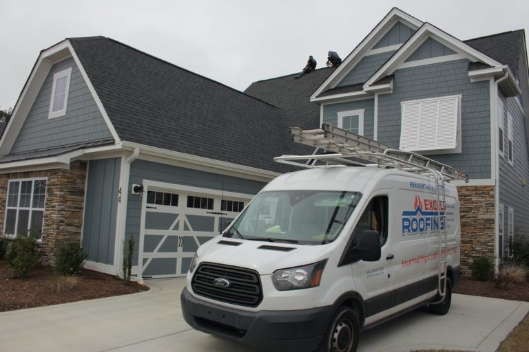 Final touches on a roof replacement in Wilmington, NC.