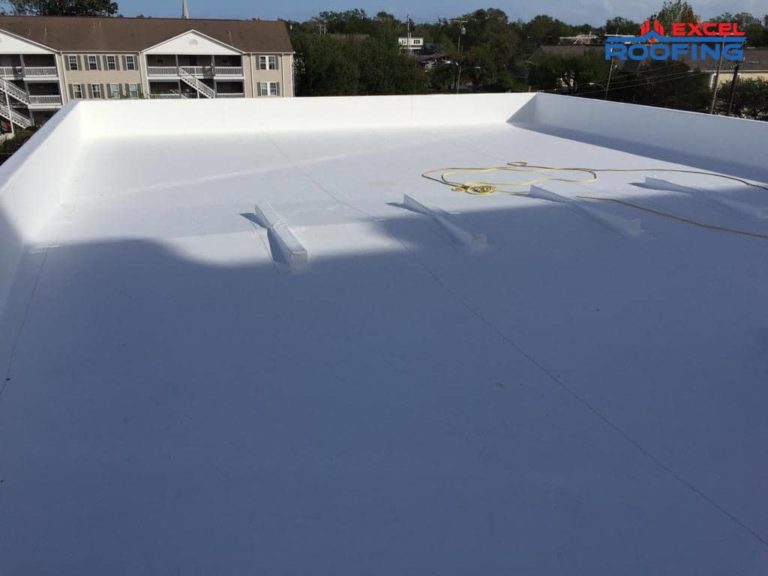 White TPO roofing replacement on an office building in Wilmington, NC.