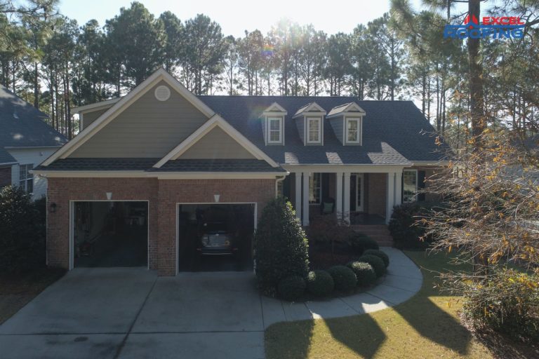 Architectural shingle roof with three dormers in Wilmington, NC.