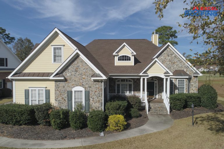Weathered wood architectural shingle roof in Wilmington, NC.