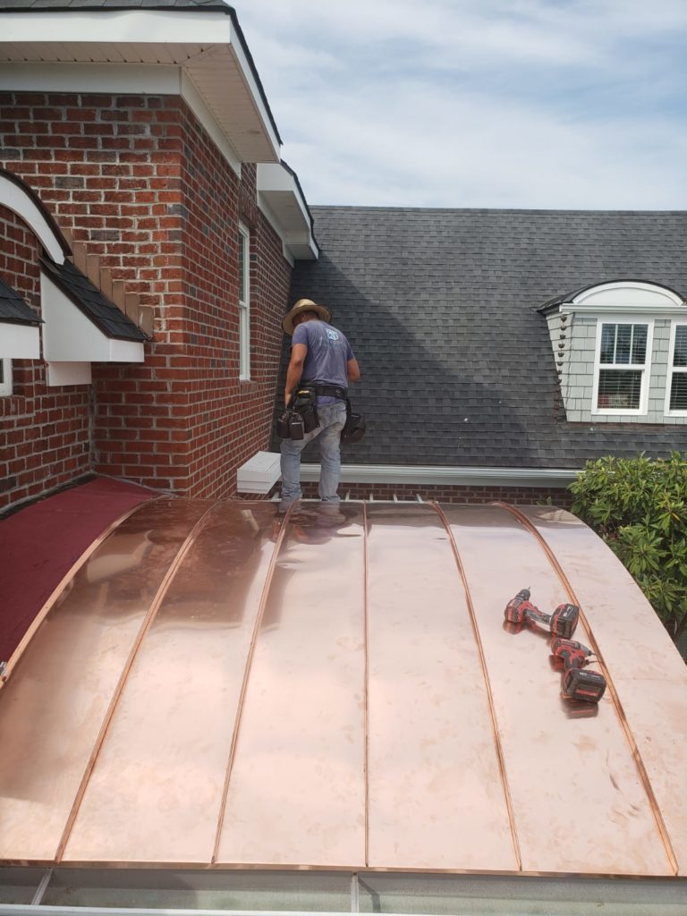 Copper metal roof installation with expert craftsmanship in Leland, NC.
