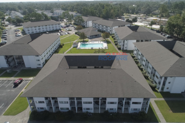 Apartment complex with new shingle roofs in Wilmington, NC.
