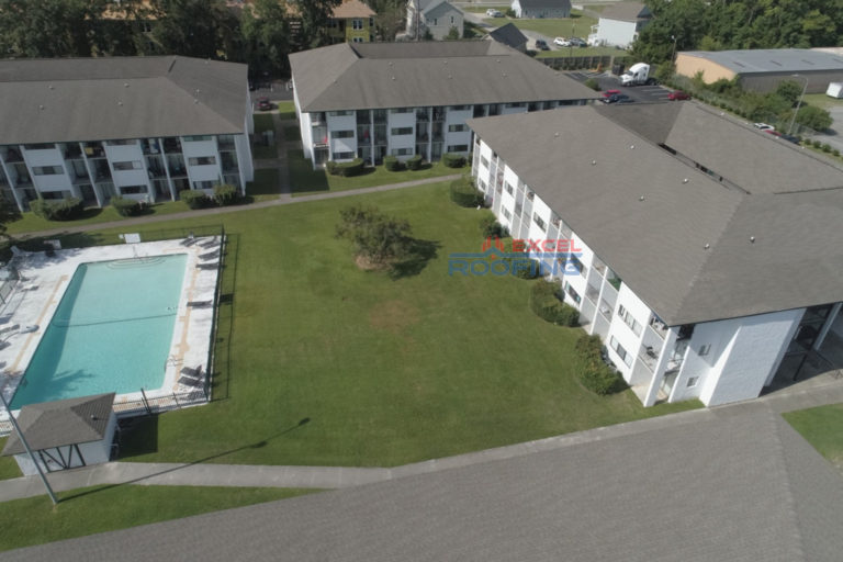 Apartment complex with new commercial shingle roofs in Wilmington, NC.