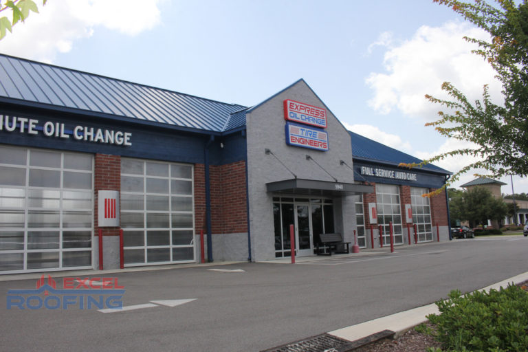 Metal roof and flat TPO roof installed on a commercial building in Wilmington, NC.