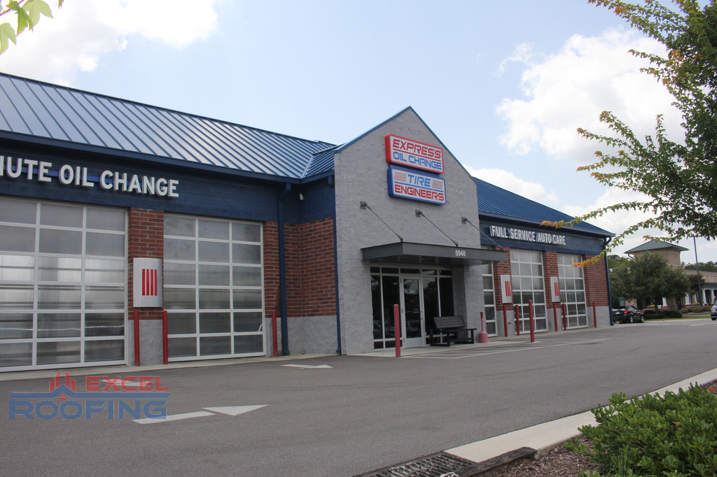 Metal roof and flat TPO roof installed on a commercial building in Wilmington, NC.