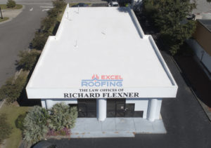 New TPO membrane roof system installed on a commercial building in Wilmington, NC, replacing an old flat roof.