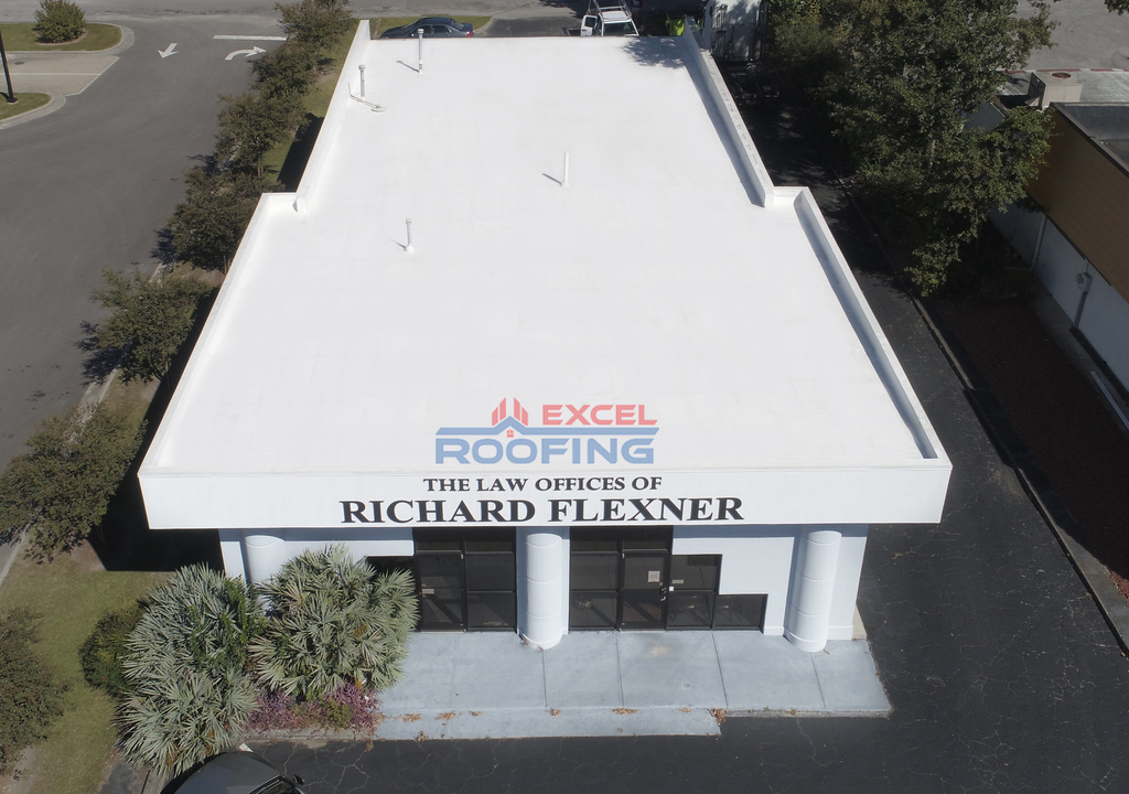 New TPO membrane roof system installed on a commercial building in Wilmington, NC, replacing an old flat roof.