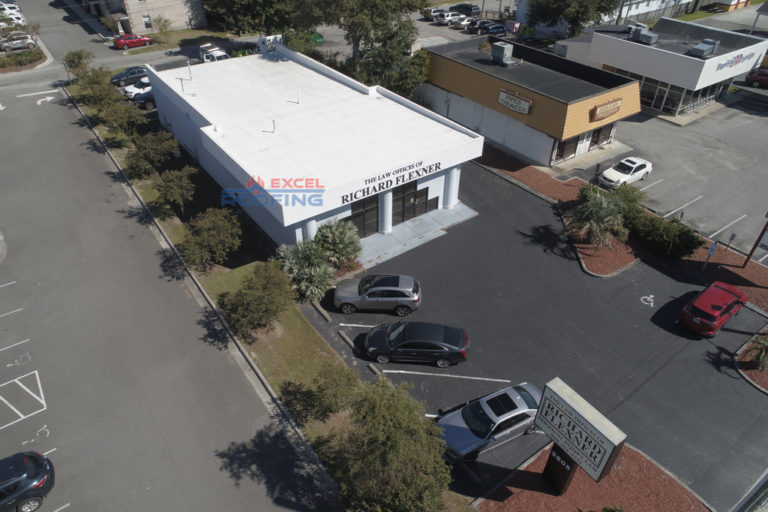 Flat roof with a new TPO membrane roof system installed on a commercial building in Wilmington, NC.