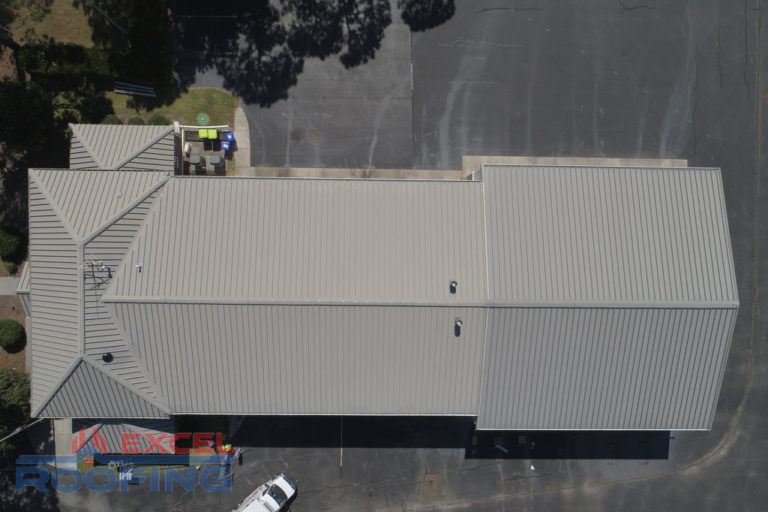 Metal roof installed by Excel Roofing Company on the fire station in St. James, Southport, NC, featuring durable materials and coastal resilience.
