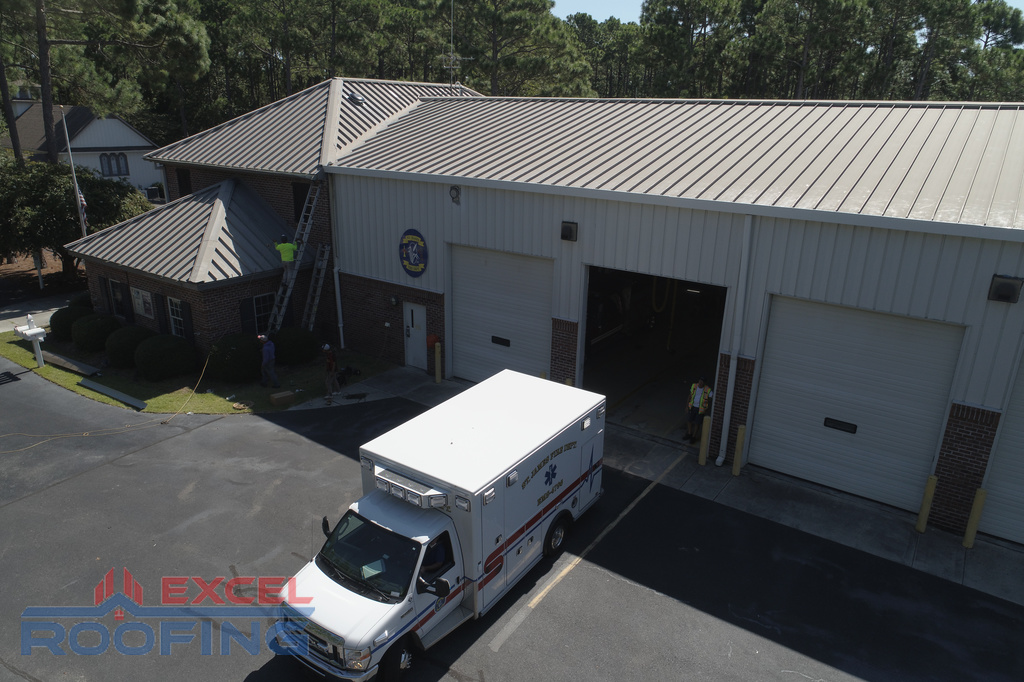 Metal roof installed by Excel Roofing Company on the fire station in St. James, Southport, NC, providing durability and weather resistance.