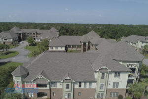 Aerial view of The Village at Mayfaire in Wilmington, NC, with GAF Timberline HD shingle roofs installed by Excel Roofing Company.