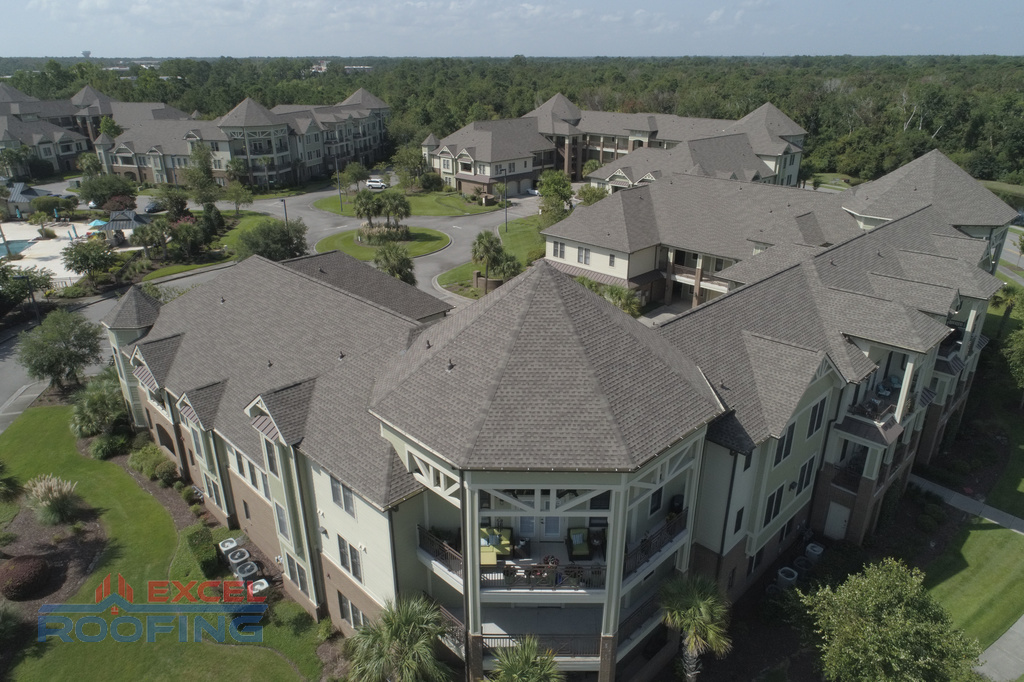Aerial view of The Village at Mayfaire in Wilmington, NC, with new GAF Timberline HD shingle roofs installed by Excel Roofing Company.