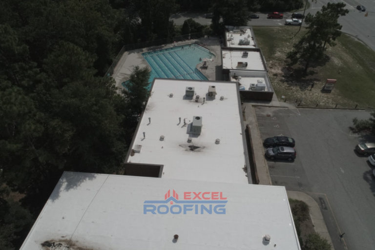 Wilmington, NC community center with a TPO flat roof and metal roof upgrade.