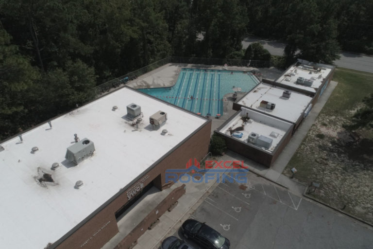 TPO flat roof with insulation and metal roof on Wilmington, NC community center.