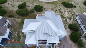 Standing seam metal roof installed by Excel Roofing in Wilmington, NC, showcasing durable materials and modern aesthetics for coastal properties.