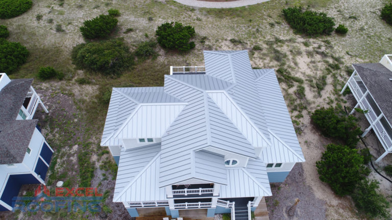 Standing seam metal roof installed by Excel Roofing in Wilmington, NC, showcasing durable materials and modern aesthetics for coastal properties.
