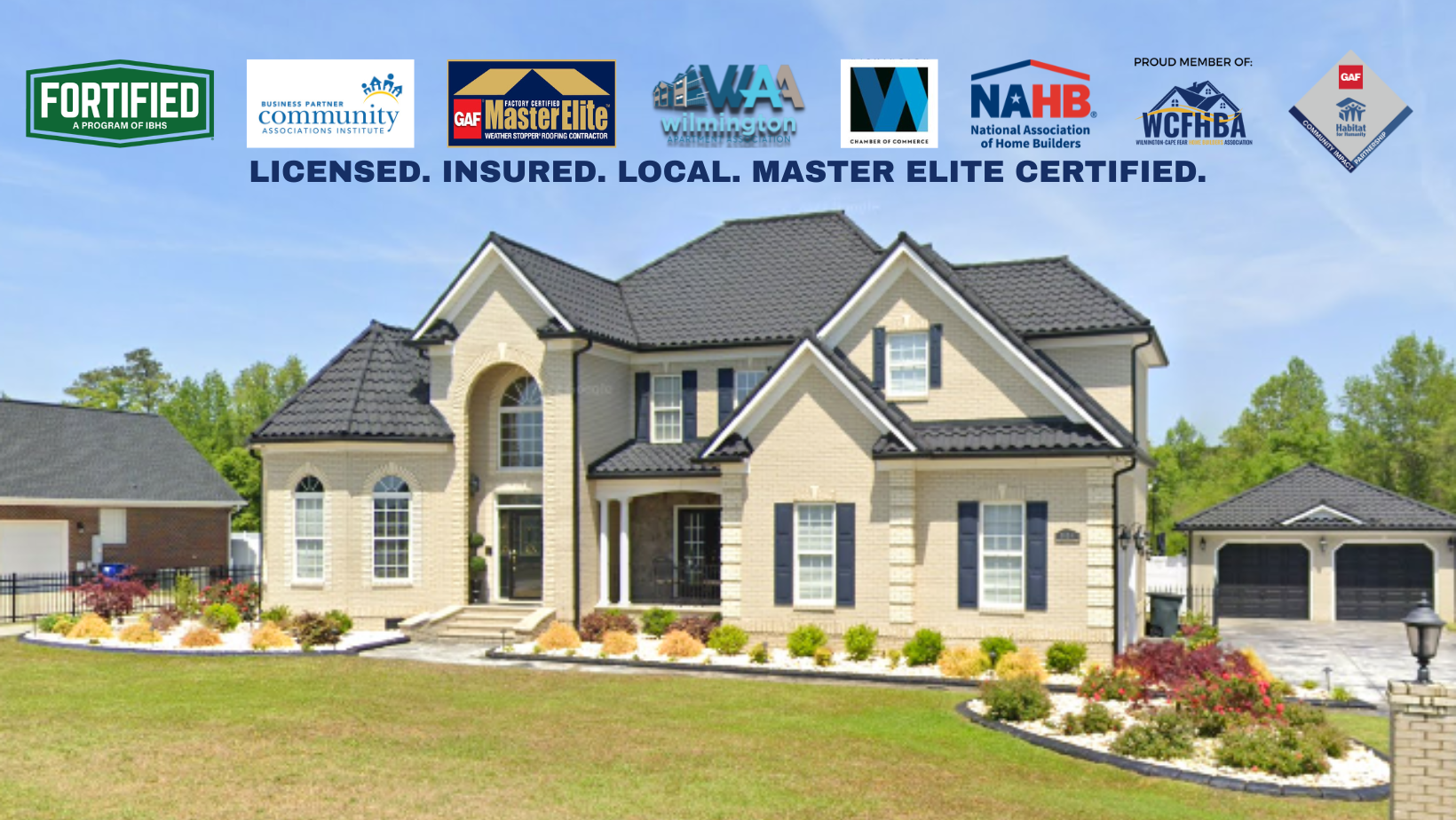 Luxury home with black tile roof installed by Excel Roofing Company in Wilmington NC – licensed, insured, and GAF Master Elite certified.